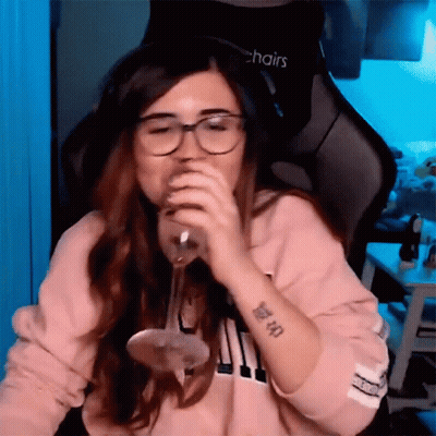 Woman In Glasses Drinking From Glass Sitting In Chairs Chair GIF