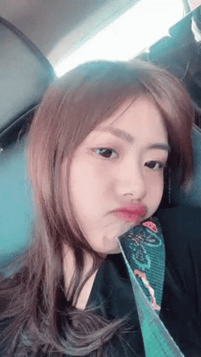 Woman In Glasses Hand On Chin GIF