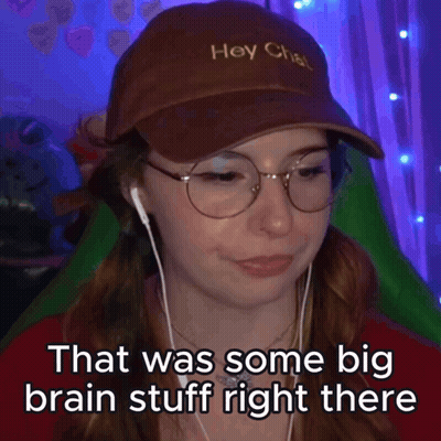 Woman In Glasses Hat Saying Hey Chat GIF
