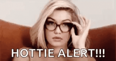 Woman In Glasses Holding Glasses GIF