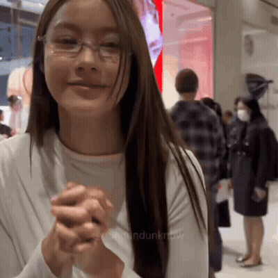 Woman In Glasses Holding Hands Together GIF
