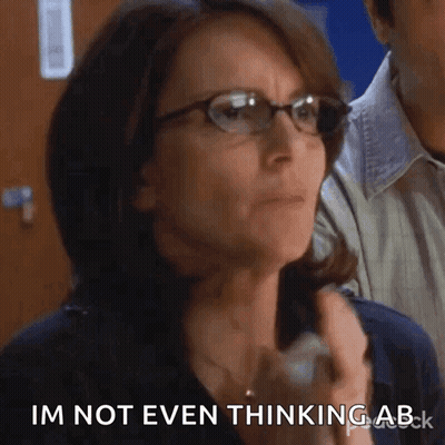 Woman In Glasses Saying I'm Not Even Thinking Ab GIF