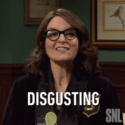 Woman In Glasses Says Disgusting In Front Of Picture GIF