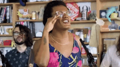 Woman In Glasses Singing Into Microphone GIF