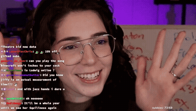 Woman In Glasses Smiling At Theatre Kid Now Data Board GIF