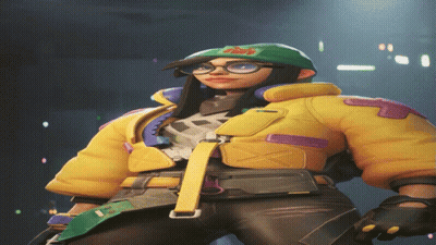 Woman In Glasses Yellow Jacket Green Hat Saying SSS GIF
