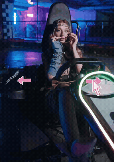 Woman In Go Kart With Pink Arrow Right GIF