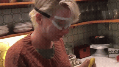 Woman In Goggles Holding Banana GIF