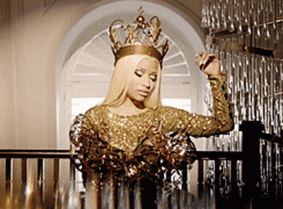 Woman In Gold Dress And Crown GIF