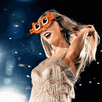 Woman In Gold Dress And Orange Sunglasses With Letter U GIF