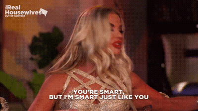 Woman In Gold Dress Saying You're Smart GIF