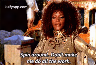 Woman In Gold Dress Says Spin Around Don't Make Me Do All Work GIF