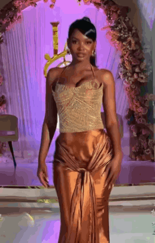 Woman In Gold Dress Walking Runway At Fashion Show GIF