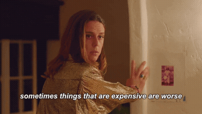 Woman In Gold Jacket Says Sometimes Things That Are Expensive Are Worse GIF