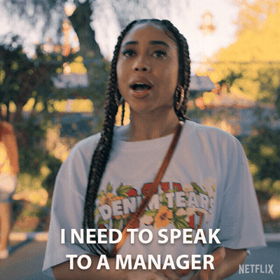 Woman In Golden Tears T-Shirt Talking To Manager On Netflix GIF