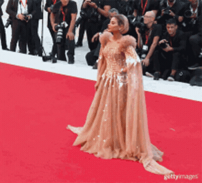 Woman In Gown On Red Carpet GIF