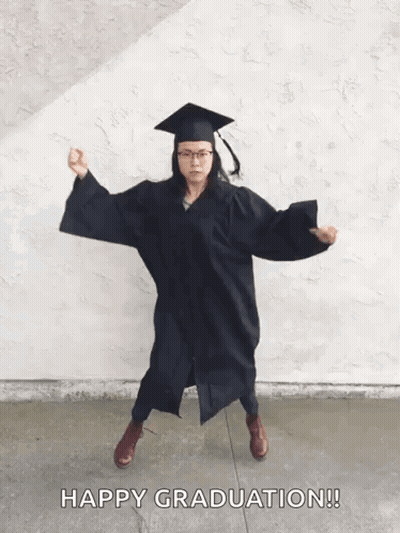 Woman In Graduation Cap And Gown Dancing GIF