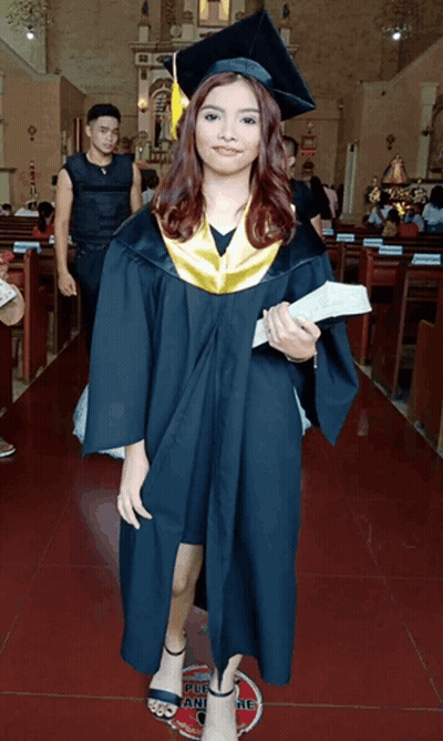 Woman In Graduation Cap And Gown GIF