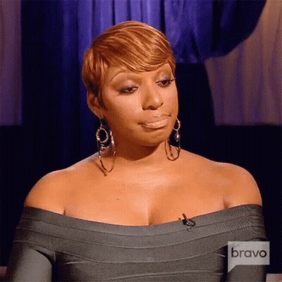 Woman In Gray Off-Shoulder Dress With Hoop Earrings On Bravo TV GIF