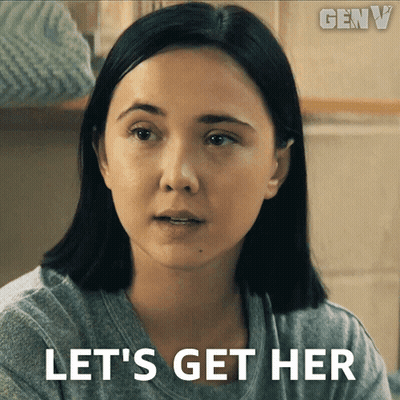 Woman In Gray Shirt Saying Let's Get Her GIF