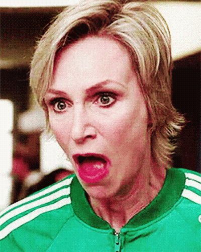 Woman In Green Adidas Jacket Surprised GIF