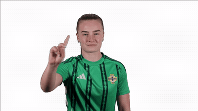 Woman In Green Adidas Shirt Holding Card GIF