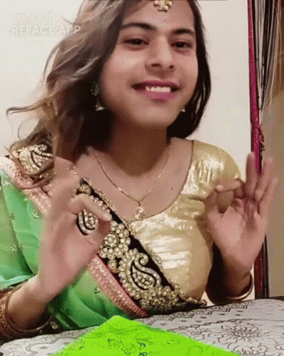 Woman In Green And Gold Dress Smiling Funny Face GIF