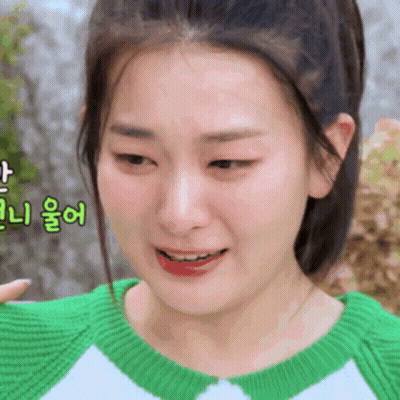 Woman In Green And White Sweater GIF