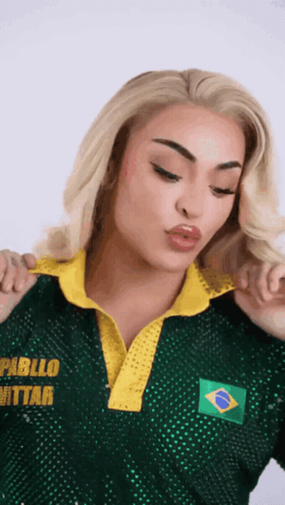 Woman In Green And Yellow Shirt With Name Pablo GIF