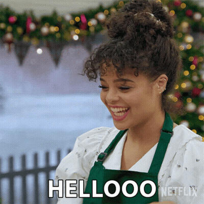 Woman In Green Apron Smiling Says Hellooo Netflix GIF