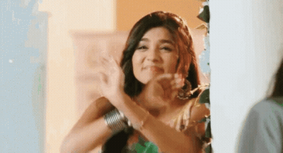 Woman In Green Dress Clapping GIF