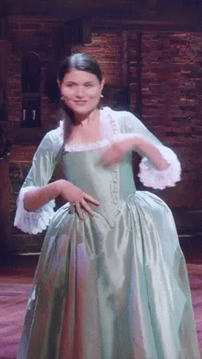 Woman In Green Dress Dancing On Stage GIF