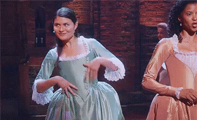 Woman In Green Dress Dancing On Stage GIF