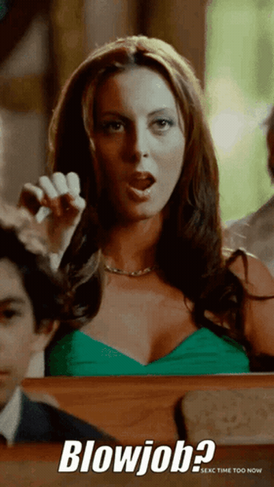 Woman In Green Dress Giving Blowjob GIF