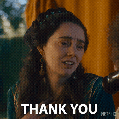 Woman In Green Dress Giving Thanks GIF