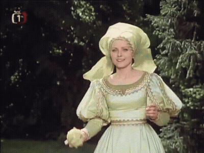 Woman In Green Dress Holding Lemon GIF
