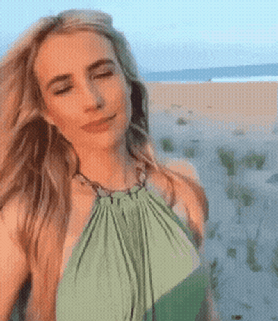 Woman In Green Dress On Beach GIF