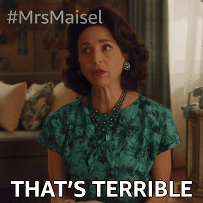 Woman In Green Dress Saying That's Terrible GIF