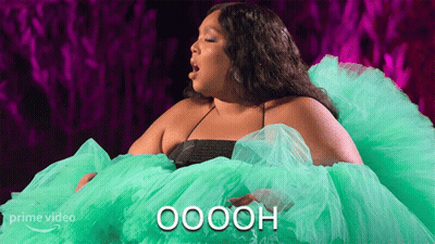 Woman In Green Dress Says Oooh GIF