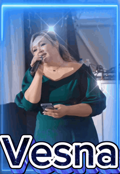 Woman In Green Dress Singing Into Microphone Vesna GIF
