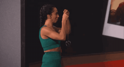Woman In Green Dress Taking Selfie GIF