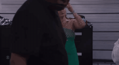 Woman In Green Dress Wearing Crown GIF