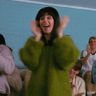 Woman In Green Fur Coat Clapping GIF