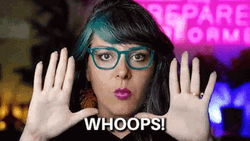 Woman In Green Glasses Whoops GIF