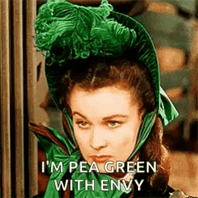 Woman In Green Hat And Green Scarf GIF
