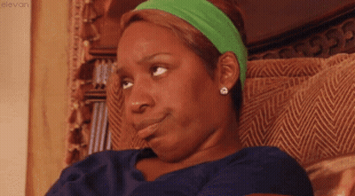 Woman In Green Headband And Earrings GIF