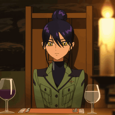 Woman In Green Jacket At Table With Wine Glasses And Candle GIF