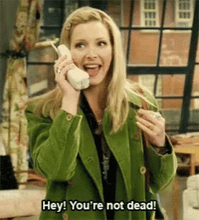 Woman In Green Jacket Says Hey You're Not Dead GIF