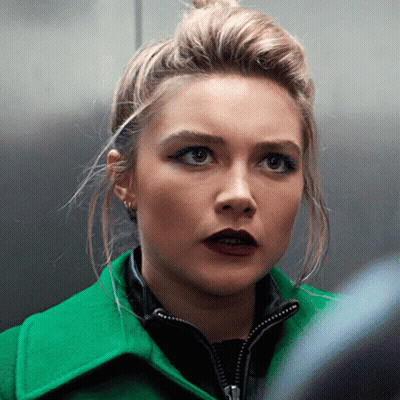 Woman In Green Jacket GIF