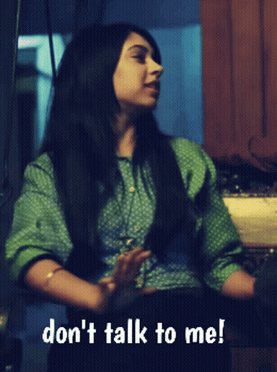 Woman In Green Polka Dot Shirt Says Don't Talk To Me GIF